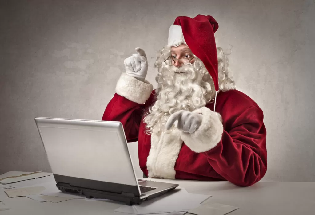 Santa typing on pc Reboot Websites